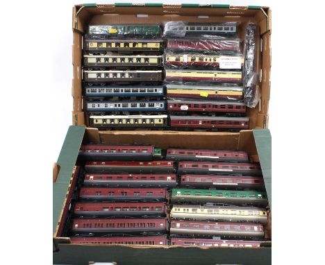 Two trays containing 32 various Hornby, Bachmann, Mainline and similar, 00 gauge items of rolling stock to include a Hornby C