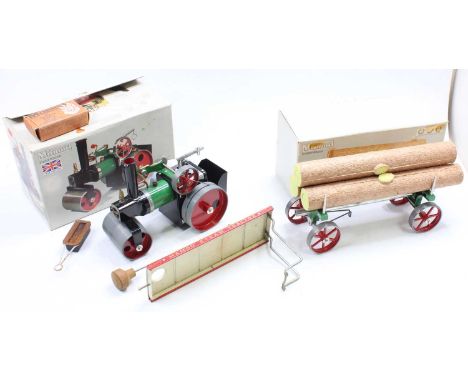 A Mamod boxed SR1A steam roller of usual specification, housed in the original card box with matching lumber wagon and loose 