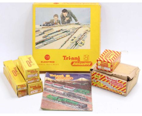 One box of Triang TT railways to include the T10 electric model railway train setP45 TransformerP42 circuit control unitT100 