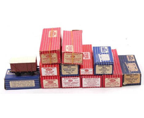 Twelve Hornby-Dublo goods wagons: 3 x 4685 Caustic Liquor tanks, plate bogies, all transfers intact (E); 2 x 4305 Passenger F