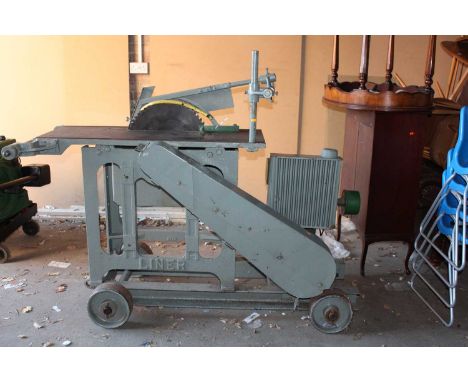 A Lister D powered Liner Saw Bench, hand painted in grey with the original blade, free running example, engine specification 