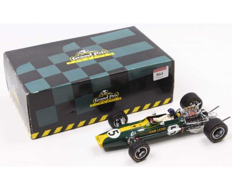 An Exoto Grand Prix Classics 1/18 scale model of a Lotus 49 No. 5 F1 race car, finished in yellow and green with racing No. 5