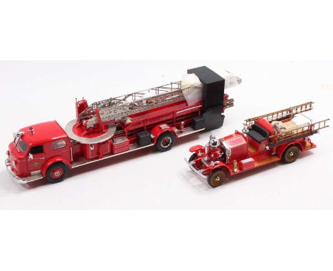 A Franklin Mint boxed fire service diecast group to include The American Le France 700 fire engine, housed in the original po