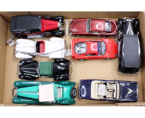 A collection of nine various 1/24 scale Franklin Mint and Danbury Mint diecast vehicles to include a Danbury Mint 1964 Aston 