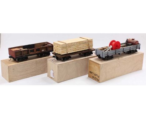 Three scratch-built G scale wagons each on two 4-wheel bogies: lumber wagon with full load of sawn timber; engineers’ flat ca