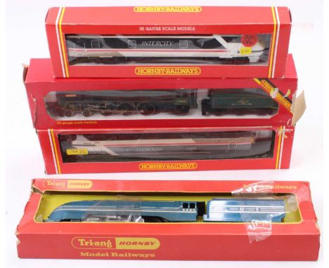 Four Hornby items: R259 ‘Britannia’ 70000 loco &amp; tender BR green (VG-E) (BP); ‘Coronation’ LMS 6220 LMS blue with silver 