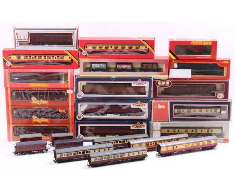 Tray containing a collection of various 00 gauge passenger stock and goods stock items to include Bachmann Crimson Suburban B