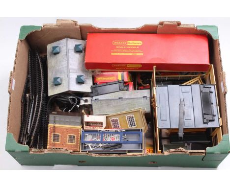 Large tray 00-gauge mainly Hornby buildings, some accessories and a small amount of track: including goods shed, diesel engin