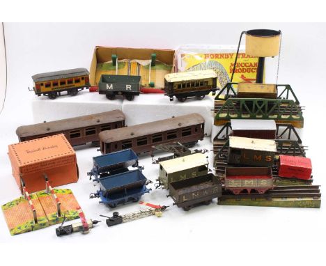 Two trays containing a variety of Hornby 0 gauge items: Watchman’s Hut missing tools but with man (VG-BVG); post-war No.1 lev
