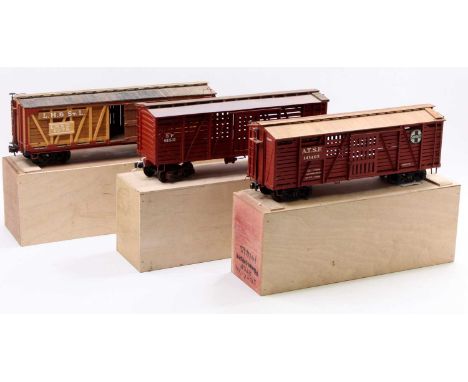 Three scratch-built G scale stock cars, each on two 4-wheel bogies, oxide colour, sliding doors: S.P. 61511; A.T.S.F 141465 a