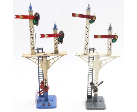 Two Hornby Junction signals. 1933-6 No.2E lighter blue base, ladder &amp; finial, red levers and red distant arms, will benef