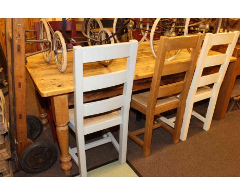 Pine farmhouse style turned leg kitchen table, 183cm long, together with six ladder back rush seated chairs