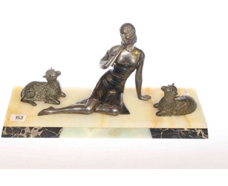 Art Deco figure group of lady and lambs on onyx base