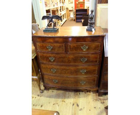 19th Century shell and chequer inlaid mahogany bow front chest of two short above three long drawers on ogee bracket feet, 11