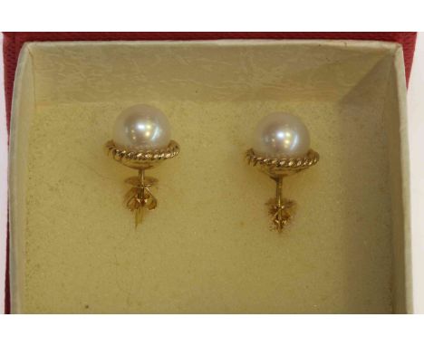 Pair of 14 carat gold and cultured pearl stud earrings