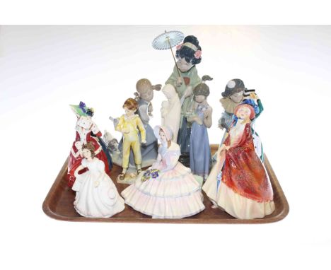 Three Lladro, Nao, Hummel, Royal Worcester, Staffordshire and five Royal Doulton figurines (12)