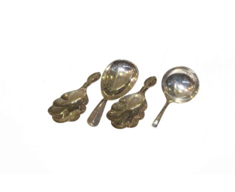 Pair of silver caddy spoons, Israel Freeman & Son Ltd, London 1931; another by the same, London 1931; and an unmarked caddy s