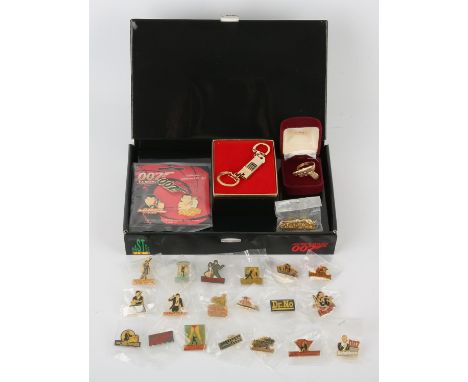 James Bond - Collection of pin and lapel badges, some vintage and a James Bond vintage ring. 