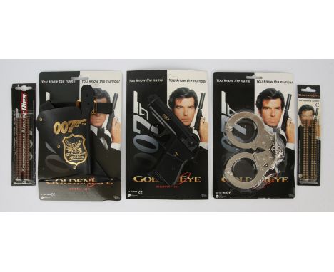 James Bond - Goldeneye and later toy pistols, holster, handcuffs and caps, all carded (5). Condition Report:  Please satisfy 