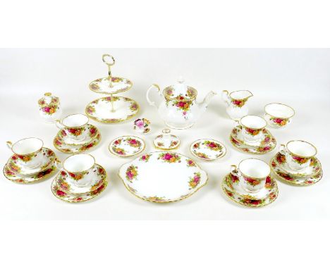 A Royal Albert part tea service, decorated in the Old Country Roses pattern, comprising teapot, milk jug, sugar bowl, sucrier