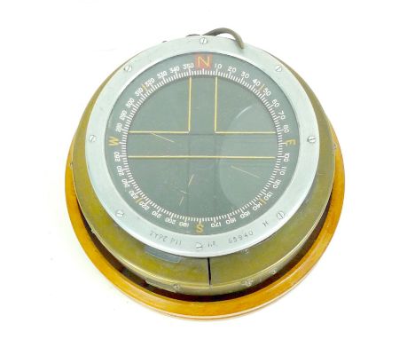 A Type PII Aircraft compass possibly for Hurricane or Spitfire, with broad arrow markings to brass casing, stamped with seria