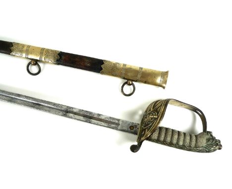 A Naval Officer's dress sword, with wire bound shagrin locking grip, with lion's head pommel, the blade etched to both sides,