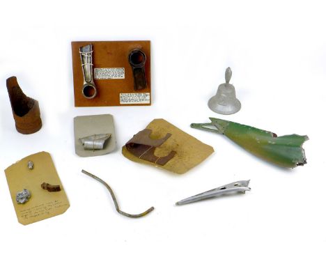 A collection of predominantly WWII aircraft relics, including a piece of a con rod from a Merlin engine, believed to be from 