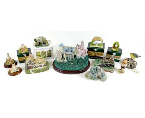 A collection of decorative ornaments, comprising six Lilliput Lane dwellings, Windsor Cottage, number L2956, signed to the gr
