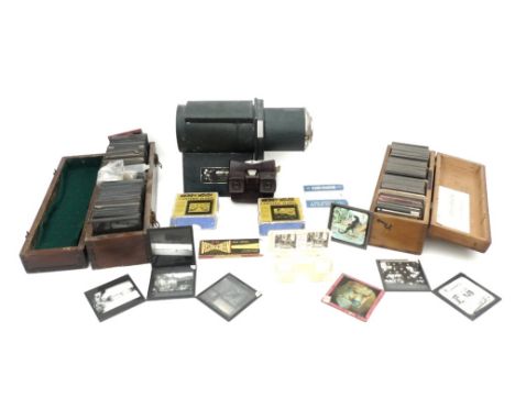 A large collection of vintage glass slides including some early 20th century photographic slides, in two wooden cases, one by