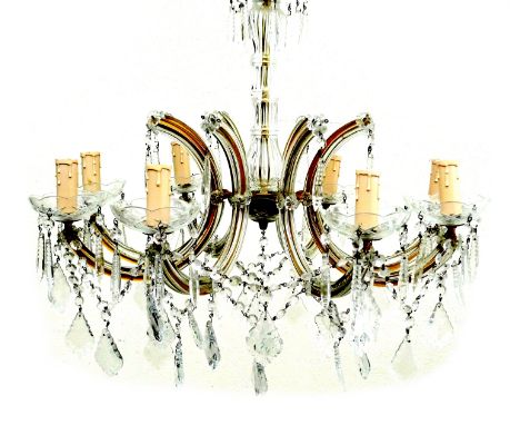 A glass and brass eight branch chandelier, with cut glass droplets, 60 by 52cm high. 
