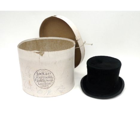 A vintage silk top hat, by S Patey, London, Ltd, internal dimensions approximately 20 by 16cm, 14.4cm high, with Locke &amp; 