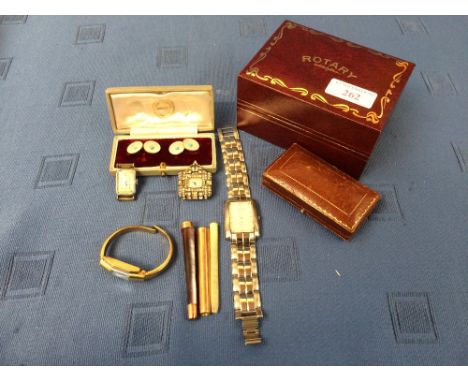A pair of Mother of Pearl panel cufflinks, tagged '9ct', cased; an unusual paste set dress clip watch; a bangle watch; a ladi