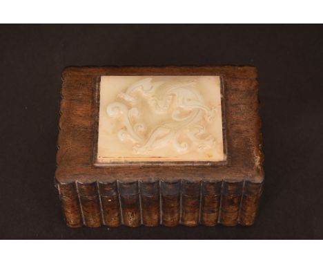 Chinese jade plaque-mounted lobbed box, possibly Zitan, the cover is inset with a jade rectangular plaque carved with dragon,