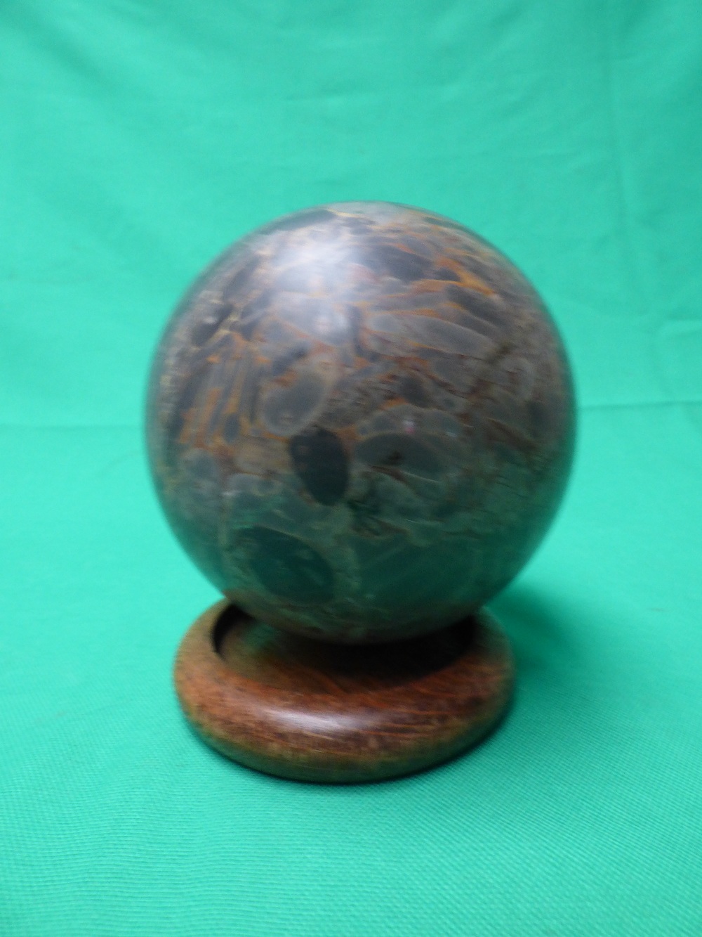 A heavy solid marble ball
