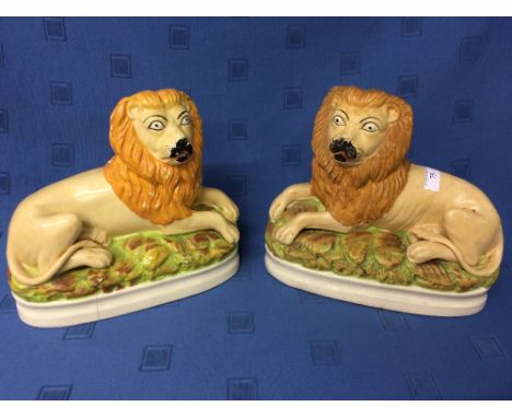 Large pair of Staffordshire figures of Lions