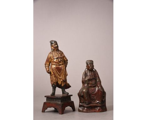 Chinese gilt-lacquered bronze figure of Guandi on stand cast in standing position and dressed in a long robe mark to the stan