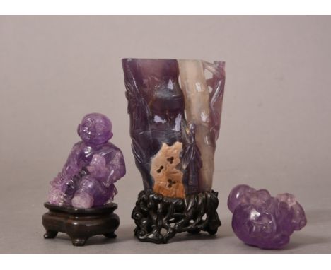 C19th Chinese amethyst vase carved in the form of bamboo trunks with leafy branches and rockworks, carved zitan stand, 10.3cm