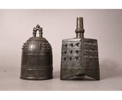Chinese bronze bell cast with taotie mask motif and bands of projecting nipples, Ming dynasty, 27.5cm high; together with a s