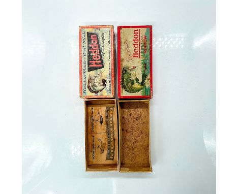 Two vintage boxes with up jumping bass picture, Heddon of Dowagiac. Box with wedge logo includes mail in request for catalog.