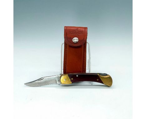 This vintage folding hunter knife was made in USA, it has sturdy wood handles and brass bolsters for a hefty weight. The stai