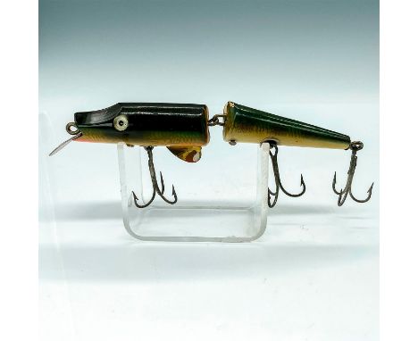 Egyptian Wobbler with a slanted forehead and elongated sloping nose and pressed eye. This lure has green photo scale finish a