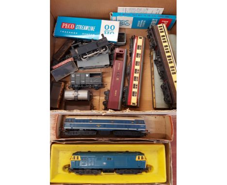 A collection of model rail including a Wrenn 0-6-0 model engine and Hornby diesel engines, coaches and wagons