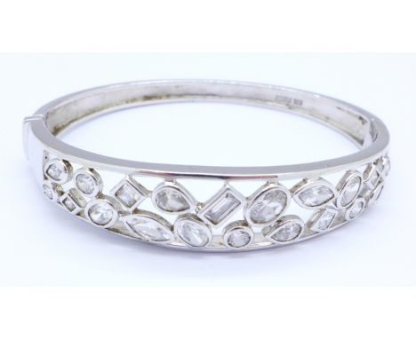 A 925 silver and cubic zirconia bangle, 28g