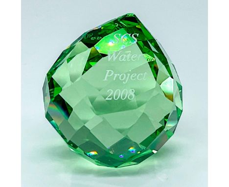 Swarovski SCS Exclusive it features peridot green faceted crystal with the words SCS Water Project 2008 on the front. Only be