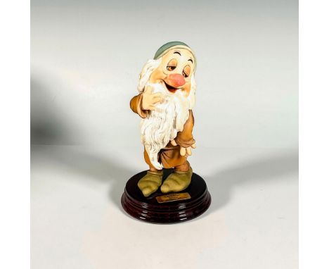 Produced in an open limited edition, featuring Sleepy from Snow White and the Seven Dwarfs in matte finish standing on a wood