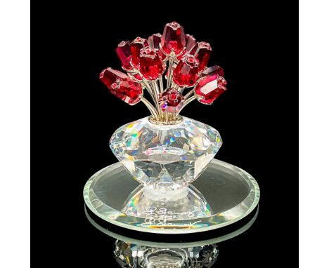 This limited-edition vase of 15 red roses (which have rhodium stems) was made to celebrate the 15th anniversary of the SCS. T