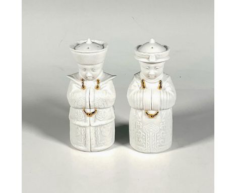 Charming set decorated in bisque and gold. with very detailed embossed clothing in the shape of two Chinese children. Made fo