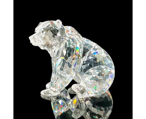 This Swarovski crystal grizzly bear is part of the Rare Encounters group. The grizzly has a clear faceted body and a molded c