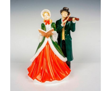 Hand decorated bone china modeled as a lively portrait of a festive duo dressed warmly as they perform their carols on a fros