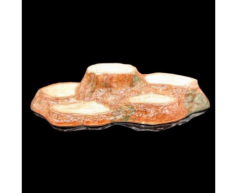Glossy multi-level figural colored in brown, tan and light green. Beswick backstamp. Issued: 20th centuryDimensions: 12"L x 7